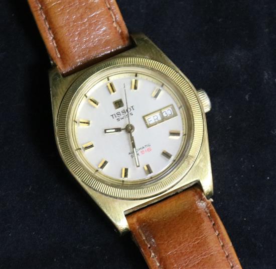 A gentlemans gold plated and steel Tissot PR 516 automatic wrist watch.
